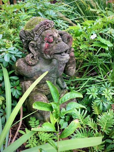 Stone monkey idol found in the jungles of Disney's Animal Kingdom.