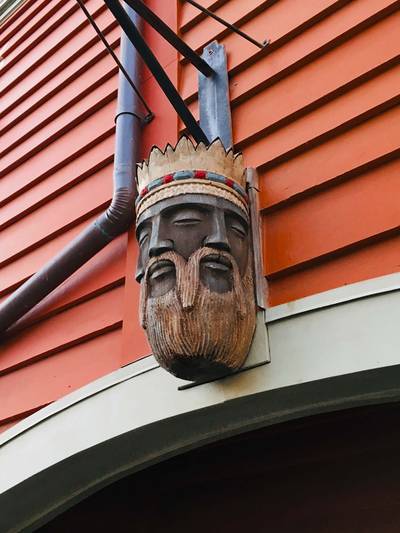 Viking carving mounted above the entrance to The Fjording, Norway, Epcot World Showcase.